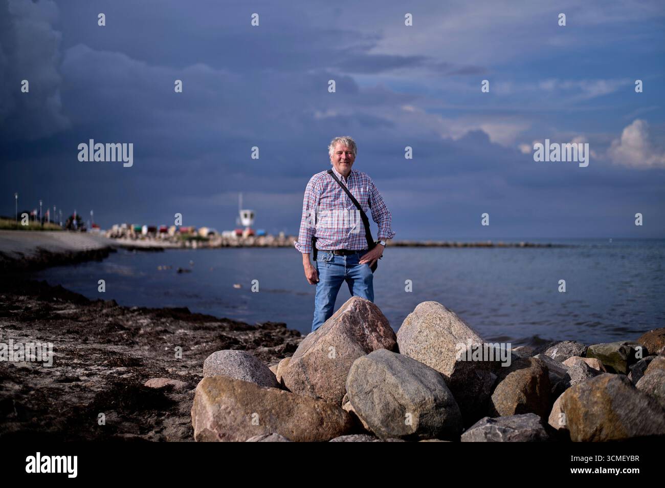 Axel Kramer a tourist guide and amber expert poses for a photo during a ...