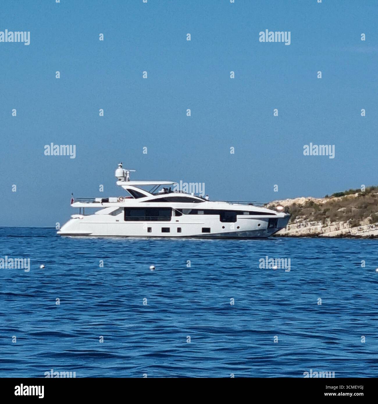 Motor cruiser coming into port in Sarande Albania - Smartphone Captured Stock Image