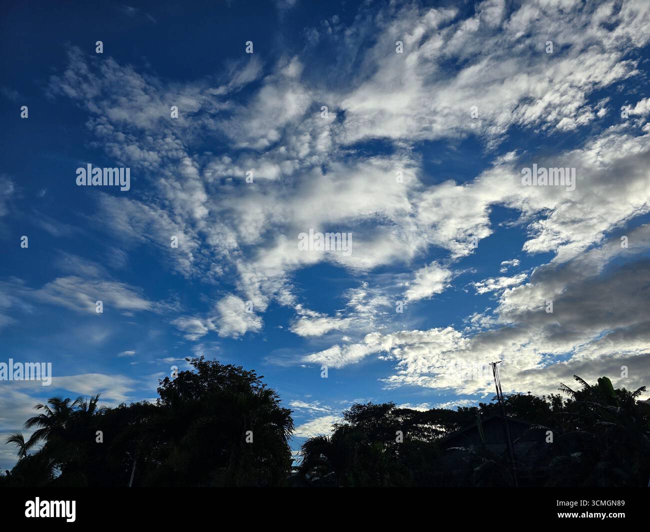 A blue sky with white clouds - Smartphone Captured Stock Image