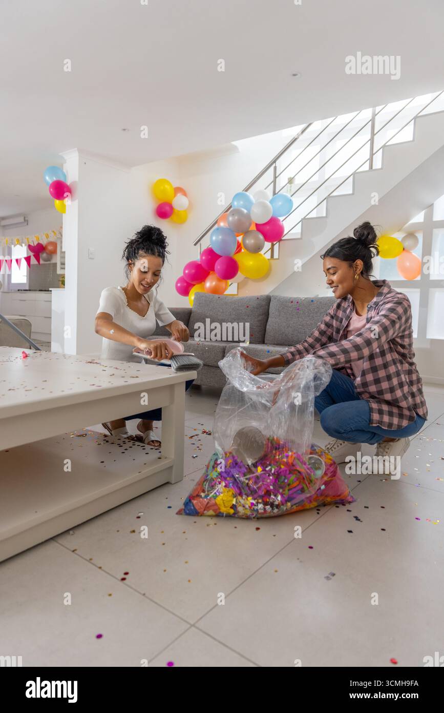 Diverse family cleaning modern living hi-res stock photography and ...