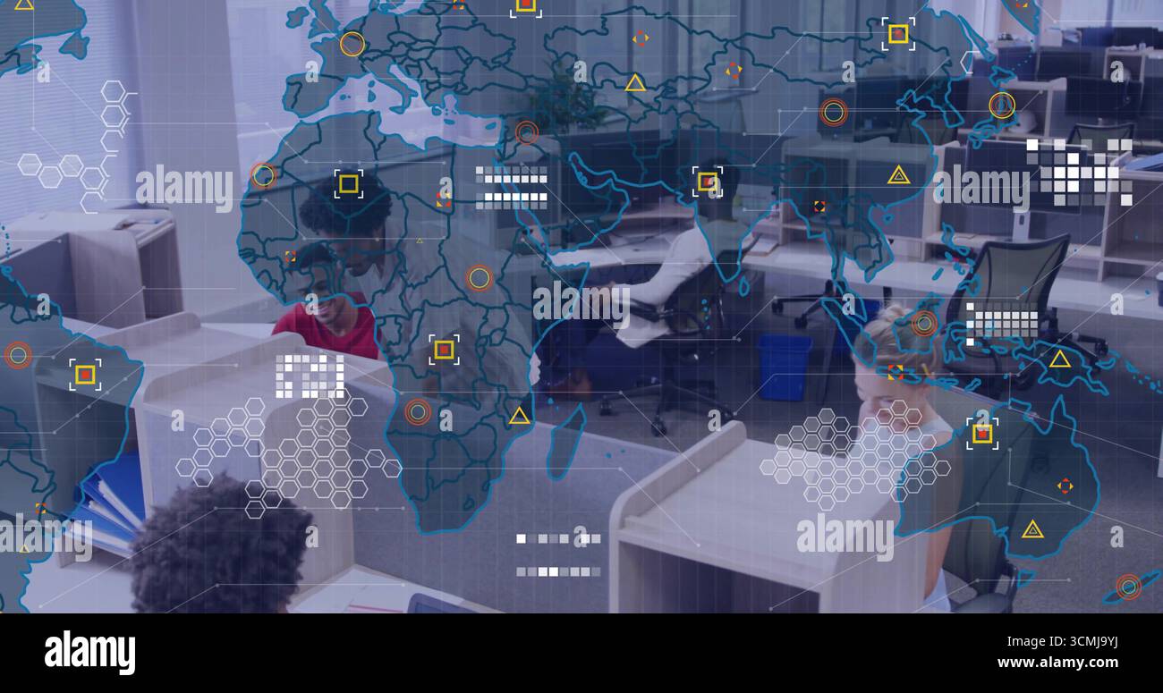 Collaborating team analyzing data at open?plan office, with dual monitors, world map overlay Stock Photo