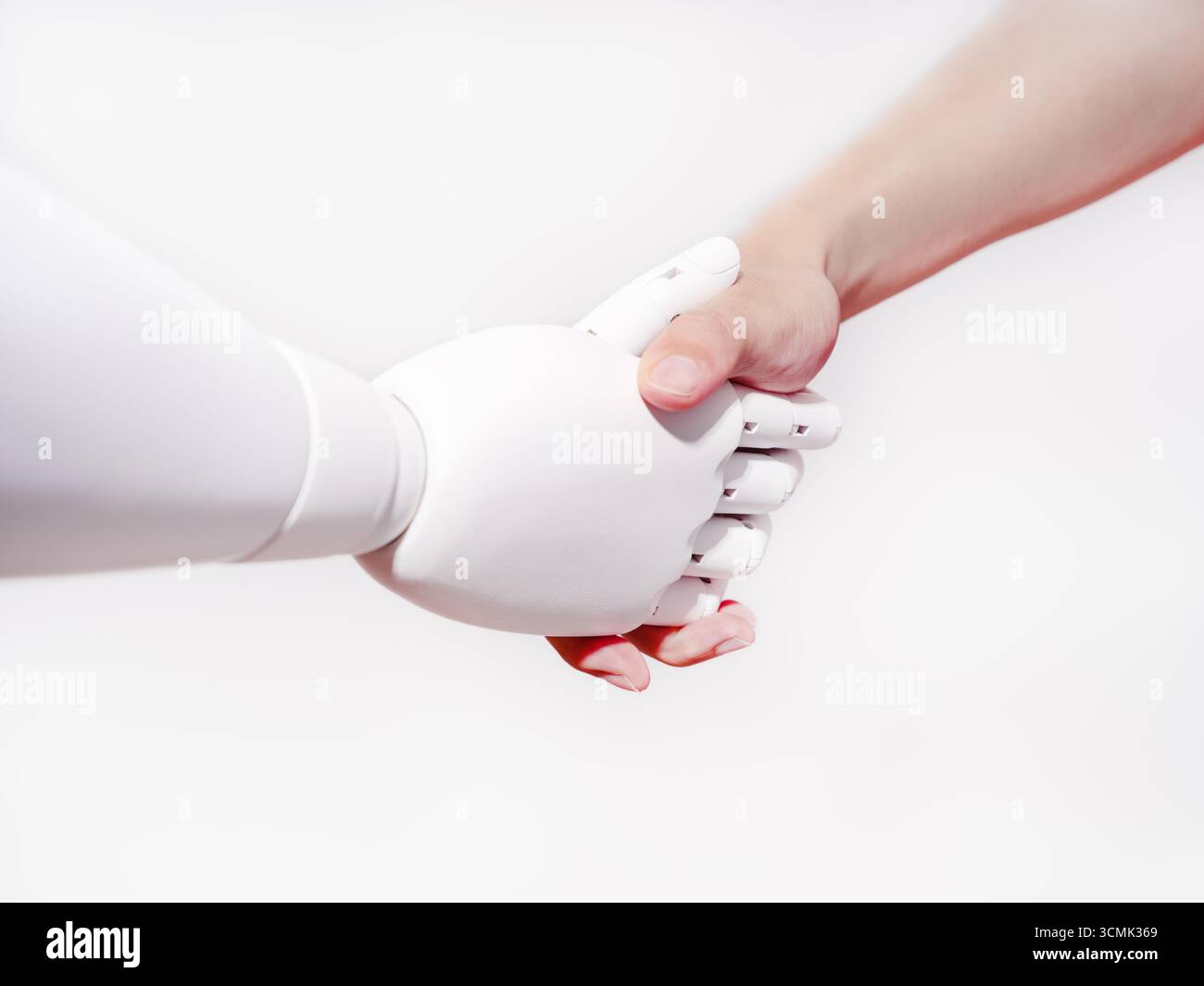 Human hand shakes robot's hand Stock Photo