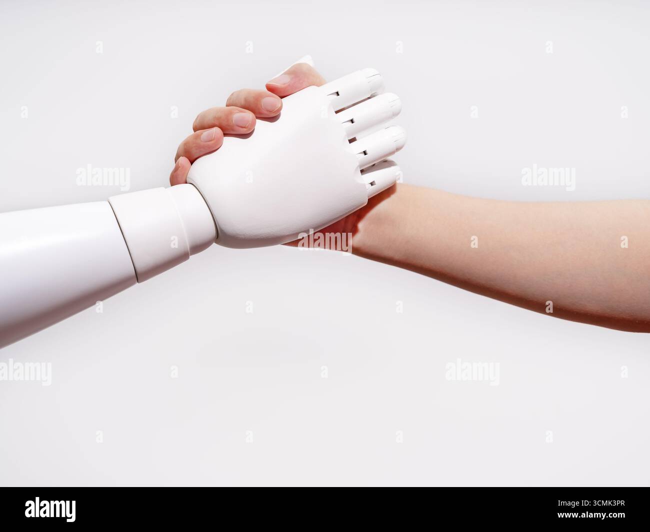 Human hand shakes robot's hand Stock Photo