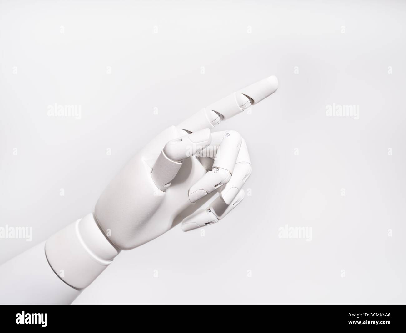 The robot's hand pointing ahead Stock Photo