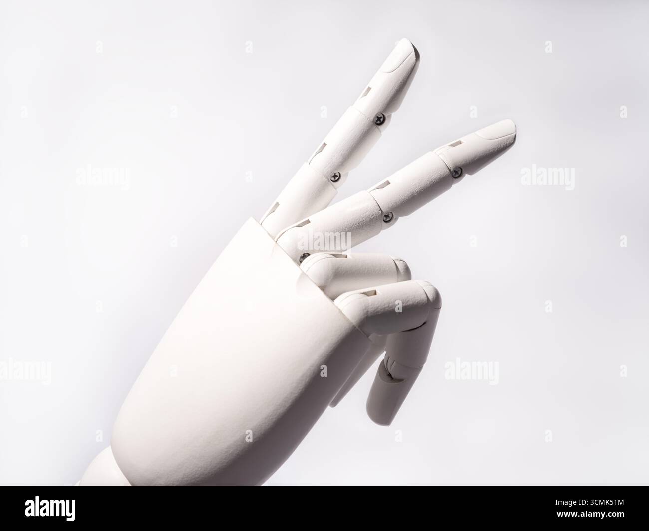 The robot's hand making a 'V' sign Stock Photo