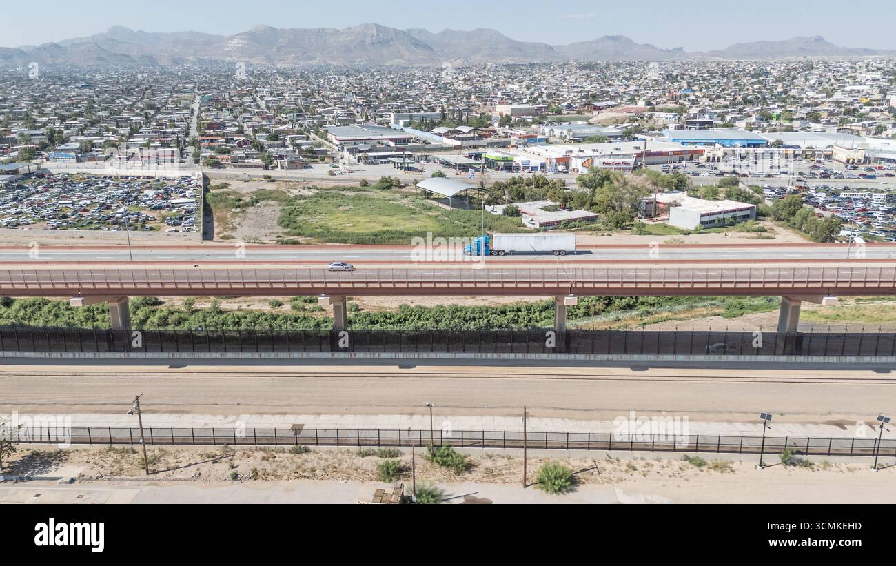 Border fence between El Paso, TX, USA and Juarez, Mexico (from the US side), El Paso, TX, USA Stock Photo