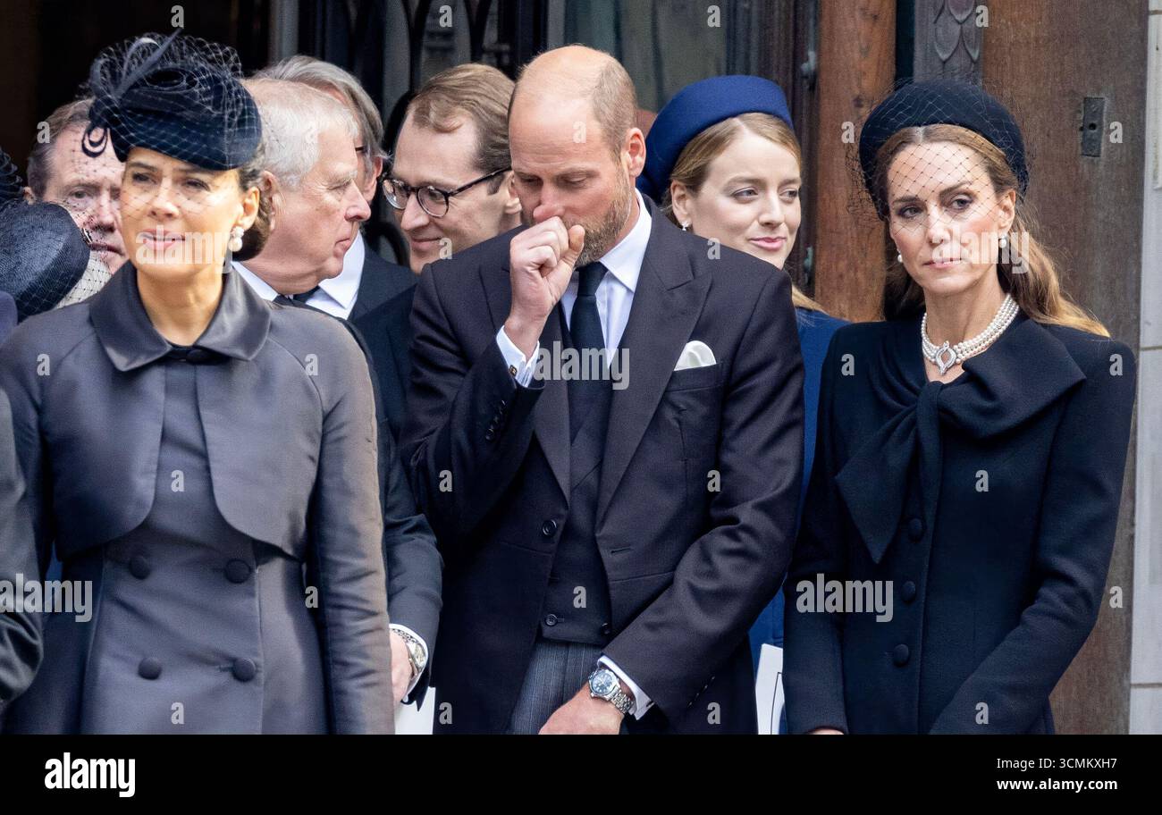 pic shows:  Funeral of Duchess of Kent 16.9.25  Prince William thumbs his nose as Prince Andrew is beside him with Princess Catherine and Sophie Winkleman left (actress    Prince and Princess of Wales Catherine and William King Charles Prince Andrew       Picture by Gavin Rodgers/ Pixel8000 Stock Photo