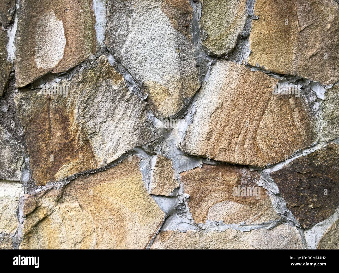 tone background. Stone texture pattern. Multi colored stones background Stock Photo