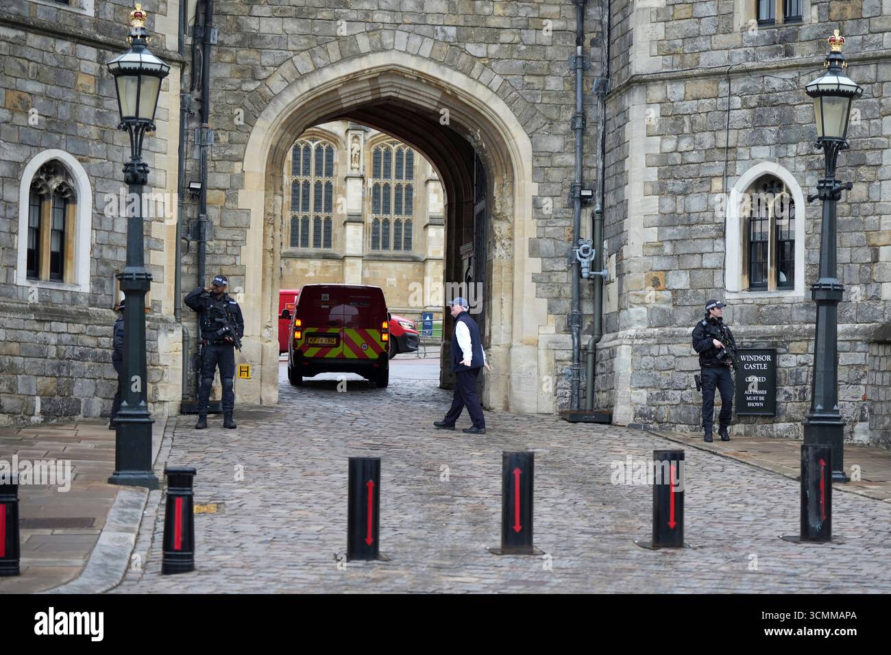 Armed police officer guard the entrance to Windsor Castle ahead of the ...