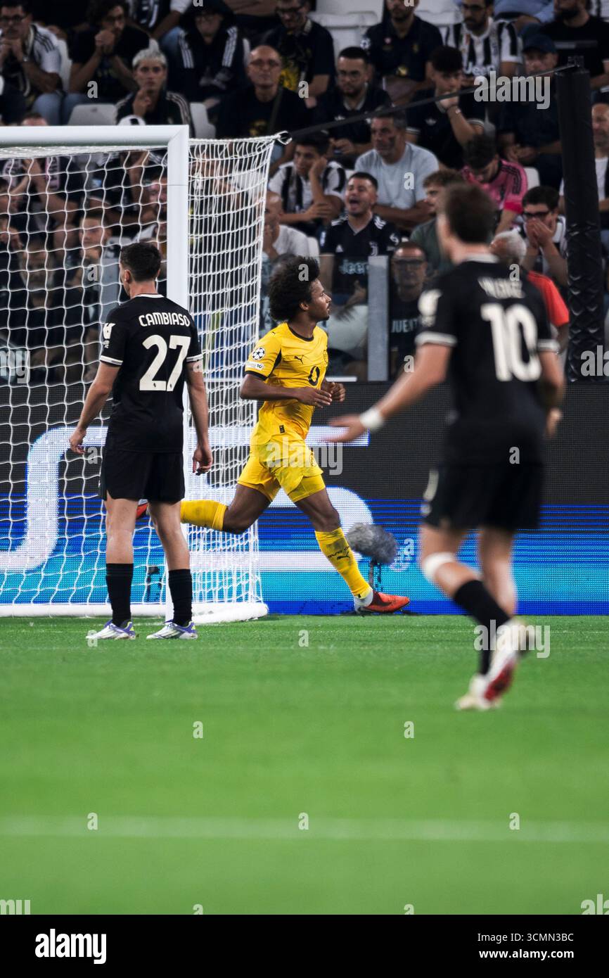 Adeyemi Running Karim Adeyemi of Borussia Dortmund celebrates after scoring a goal ...