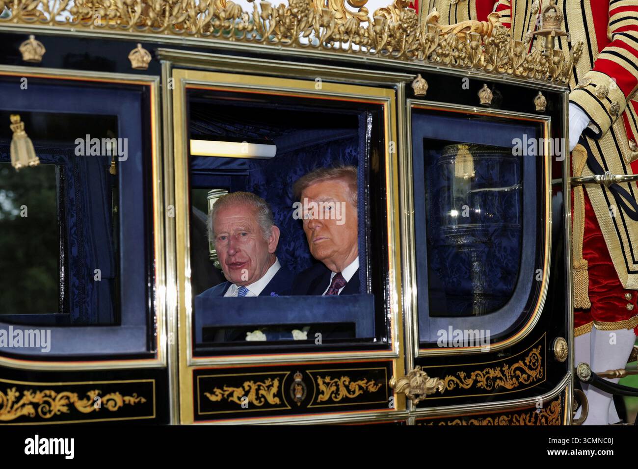 Britain's King Charles III and President Donald Trump sit in a carriage ...