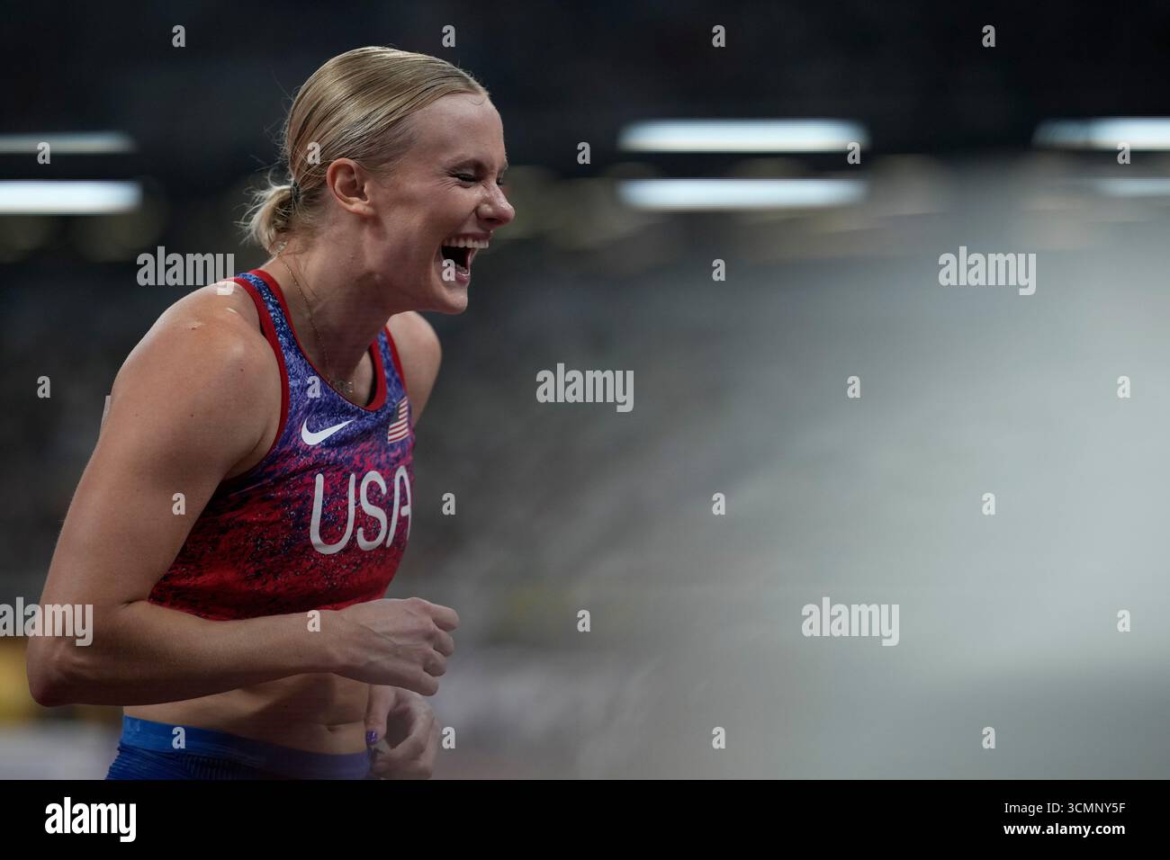 United States' Katie Moon reacts after an attempt in the women's pole ...