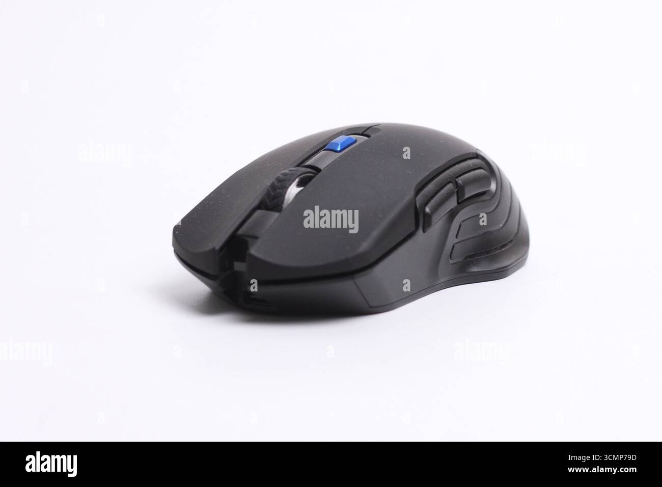 Black wireless computer mouse isolated on white background. Stock Photo