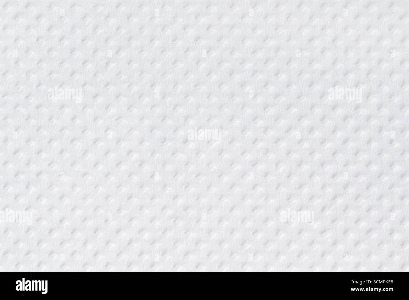 Light textile background with a clear texture and a small geometric pattern. A solid white surface with a soft three-dimensional effect. Stock Photo