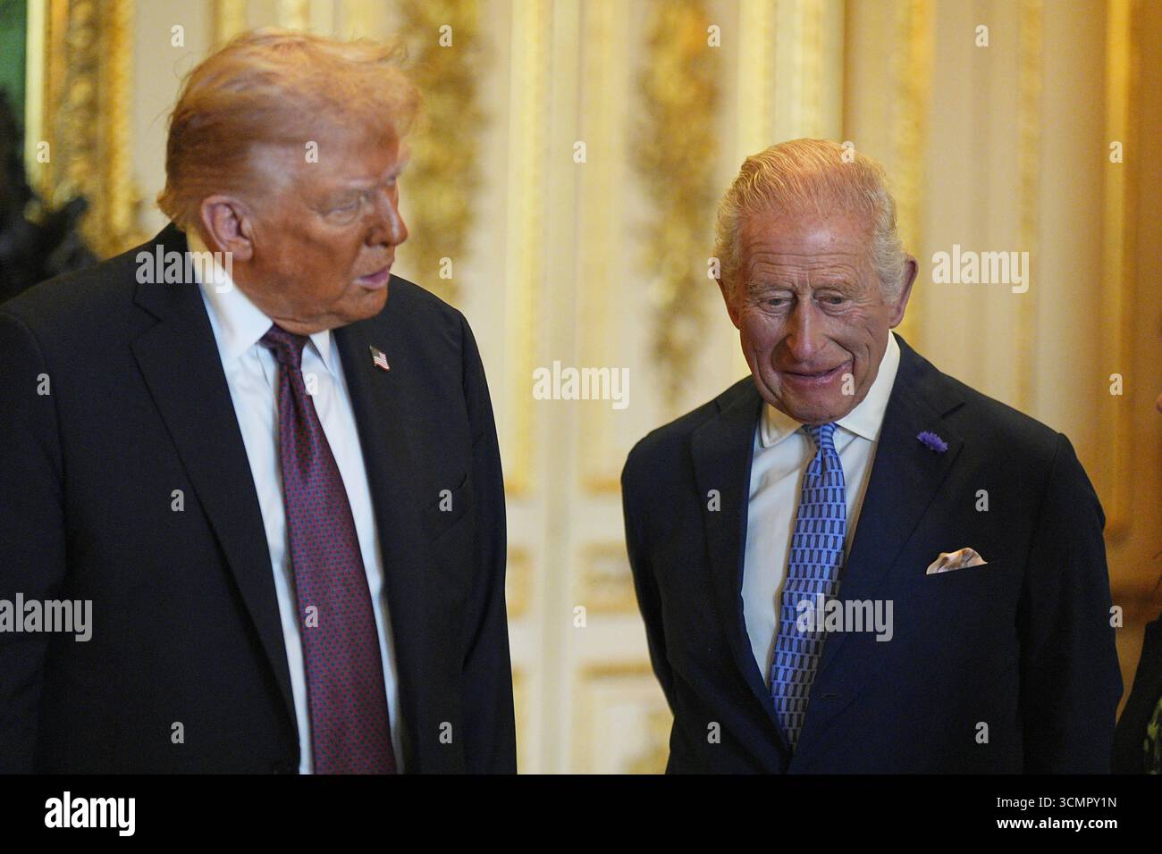 President Donald Trump, left, and Britain's King Charles III talk ...