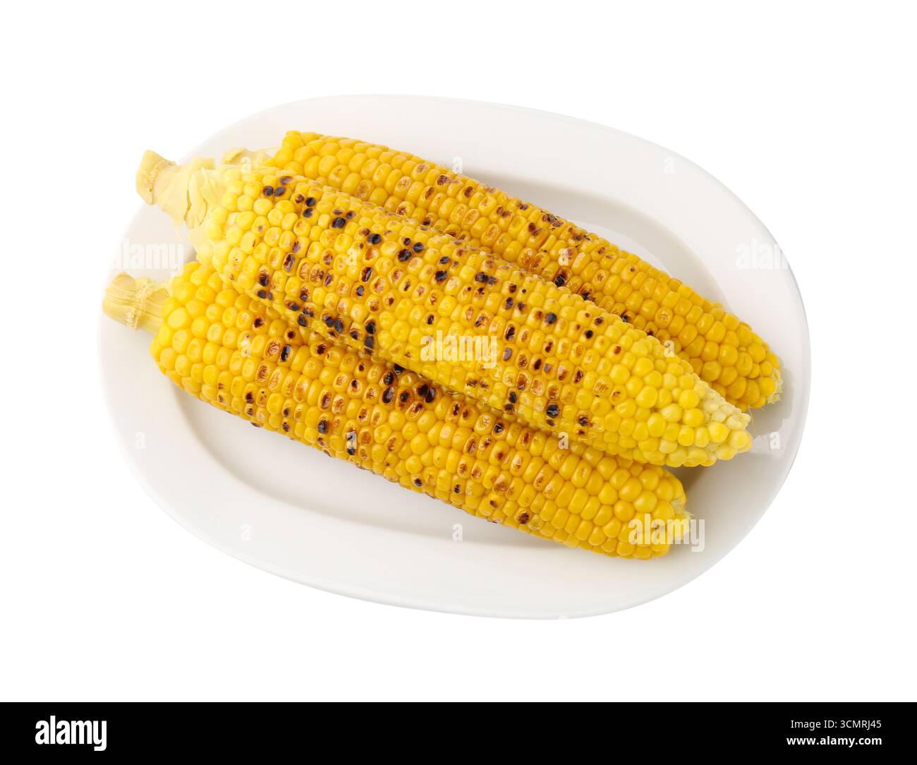 Three tasty grilled corncobs isolated on white, top view Stock Photo