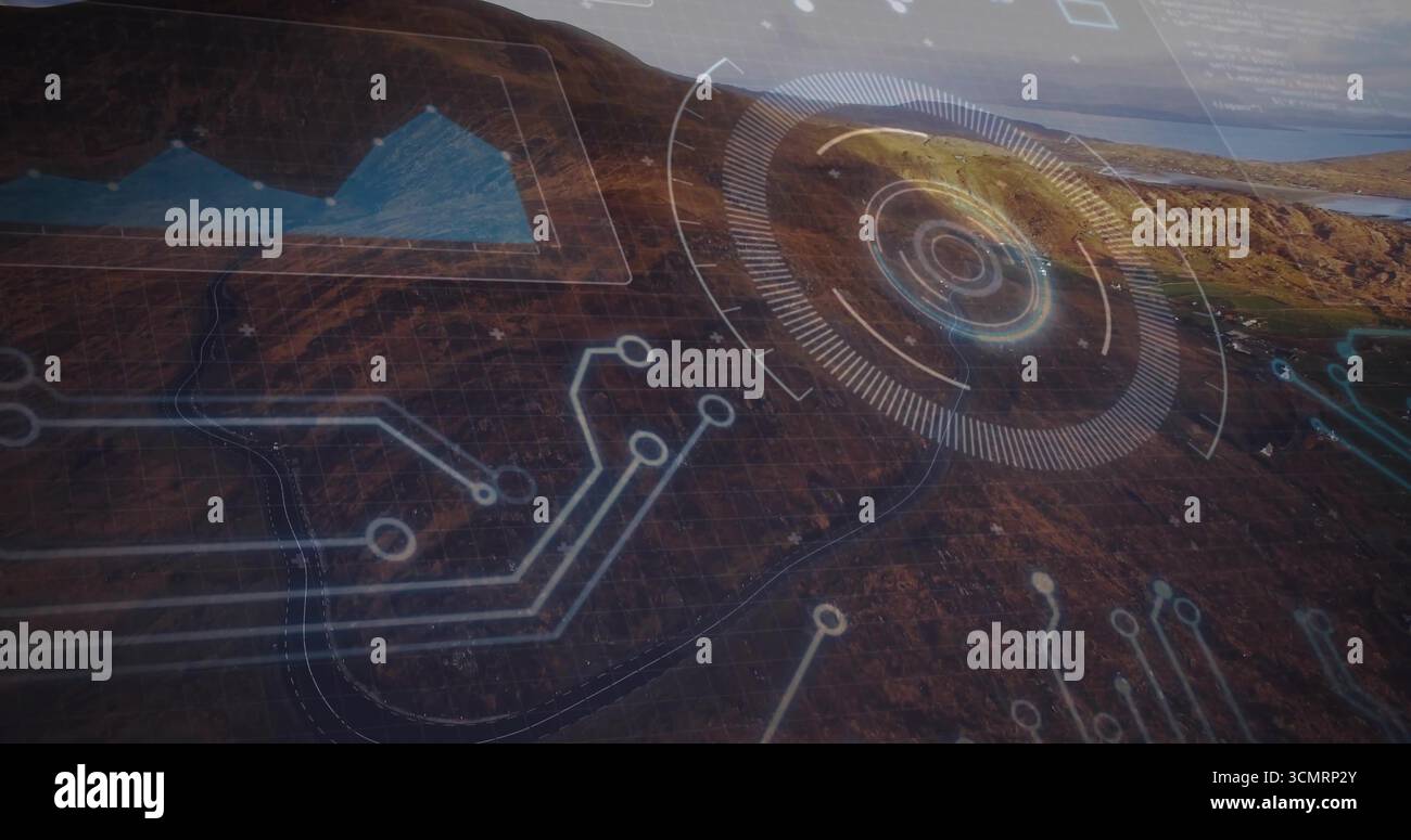 Projecting digital HUD interface hovering over brown hillside, with circuit lines and graph panel Stock Photo
