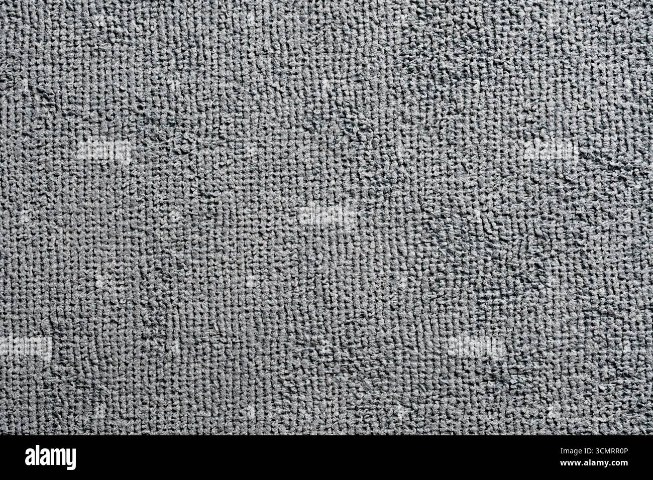 Grey color cleaning rag microfiber cloth background and texture, close up, top view. Detail sample clean fabric texture backdrop Stock Photo