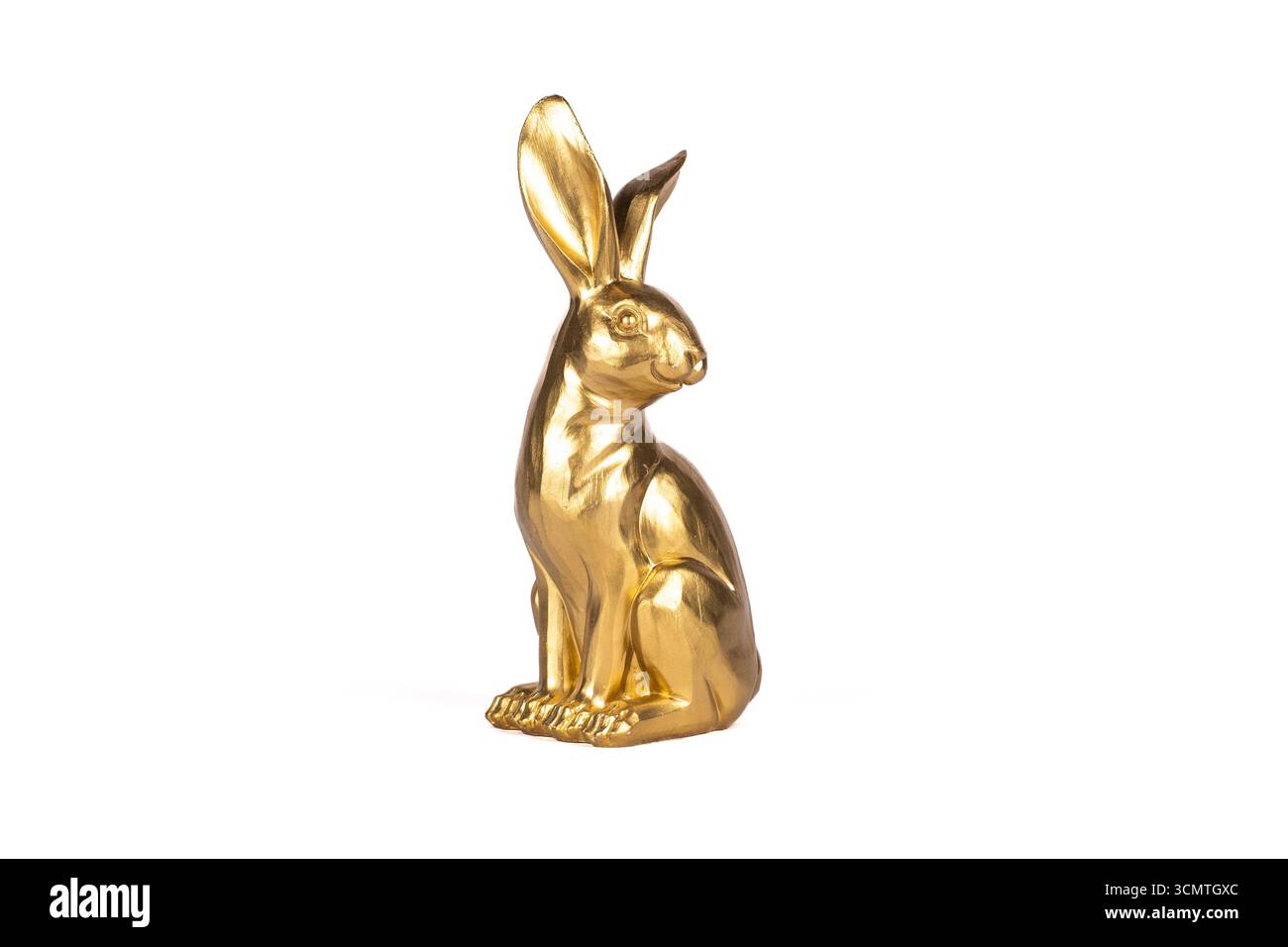 Adorable cute gold easter bunny tabletop figurine Stock Photo