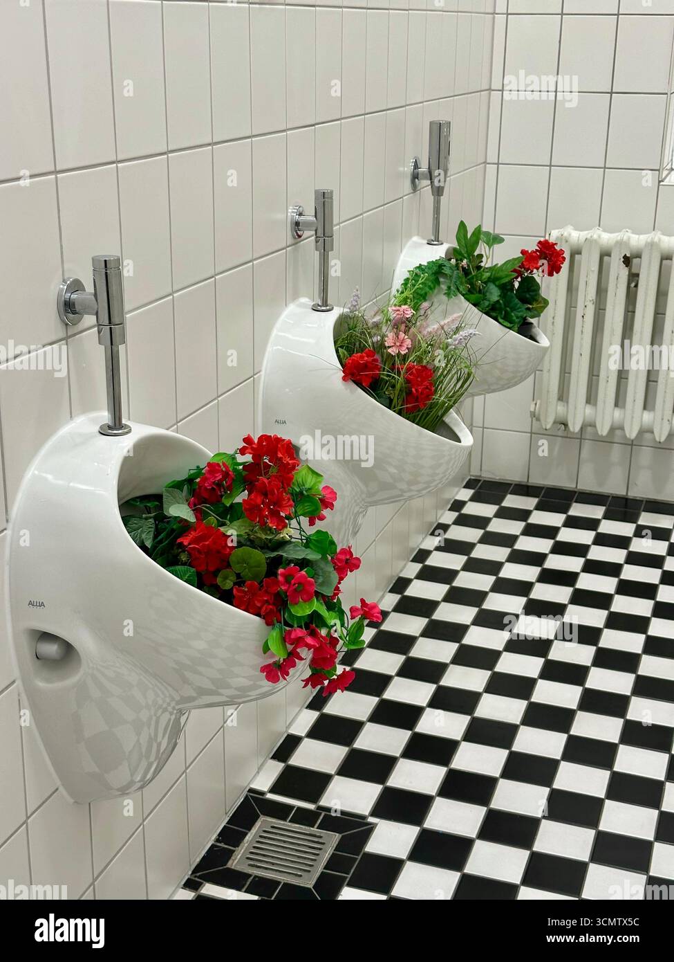 Unisex urinals hi-res stock photography and images