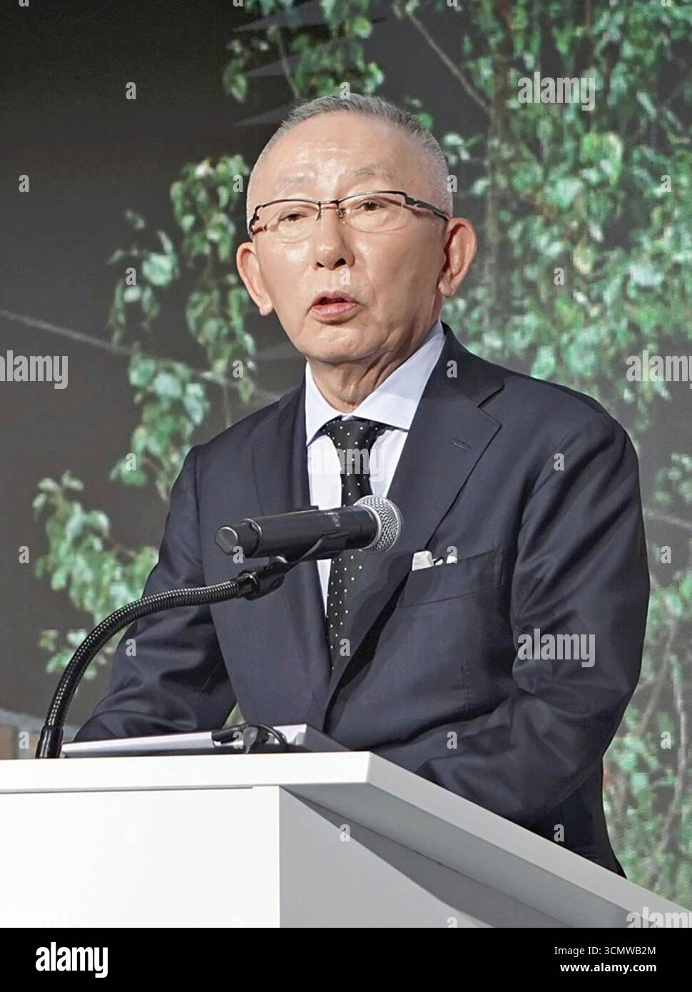 Tadashi Yanai, president of Fast Retailing, attends a press conference