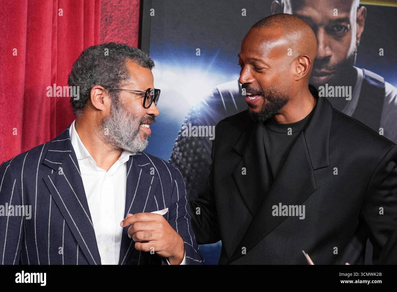 Jordan Peele, left, and Marlon Wayans arrive at the premiere of 