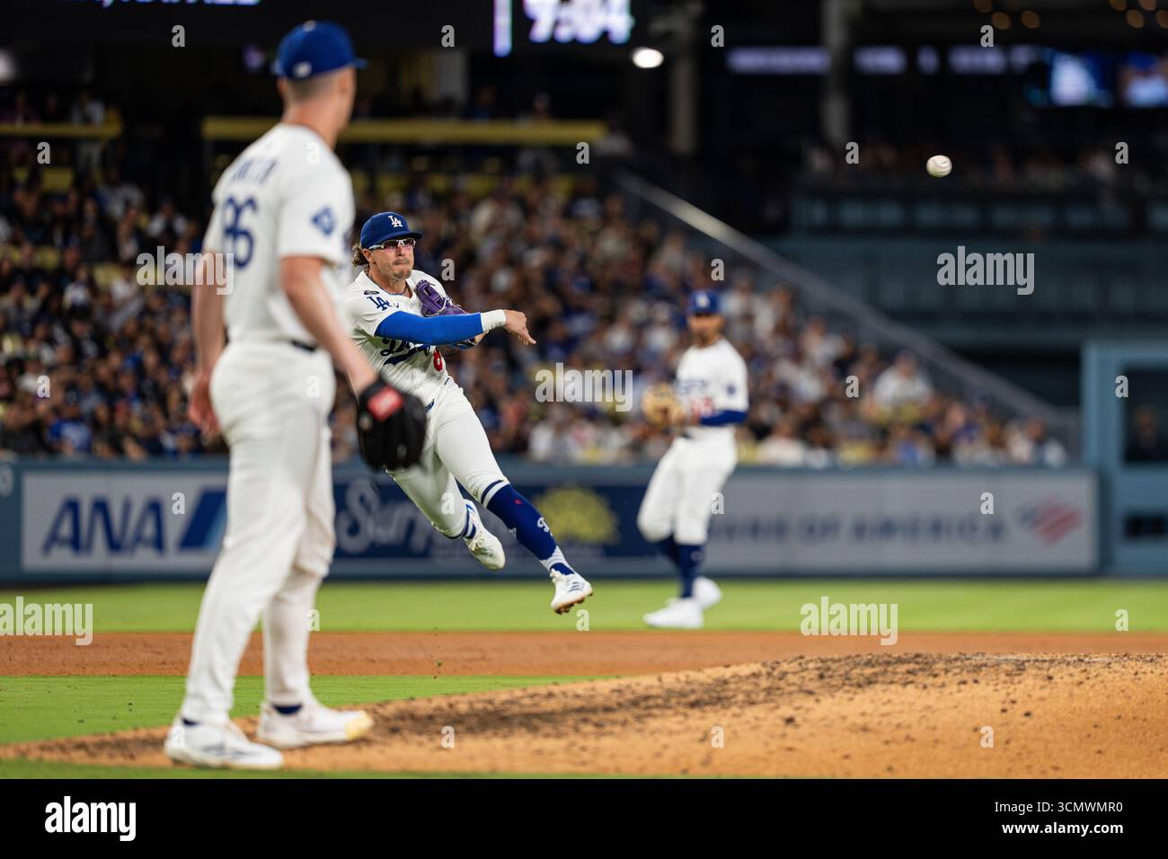 Los Angeles Dodgers first base Enrique Hernández (8) throws to first ...