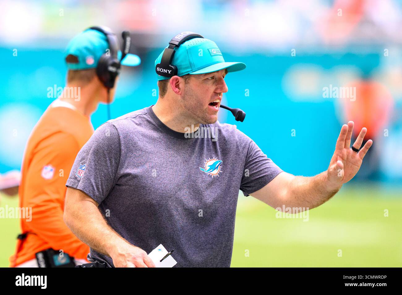 Miami Dolphins defensive line coach Austin Clark gestures on the ...