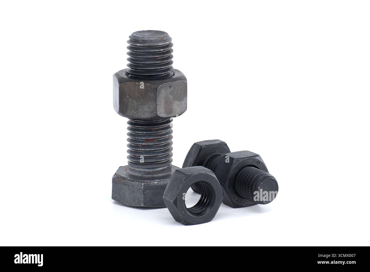 High-quality close-up image of metal bolts and nuts, showcasing threading, used in construction and engineering applications. Perfect for industrial, Stock Photo