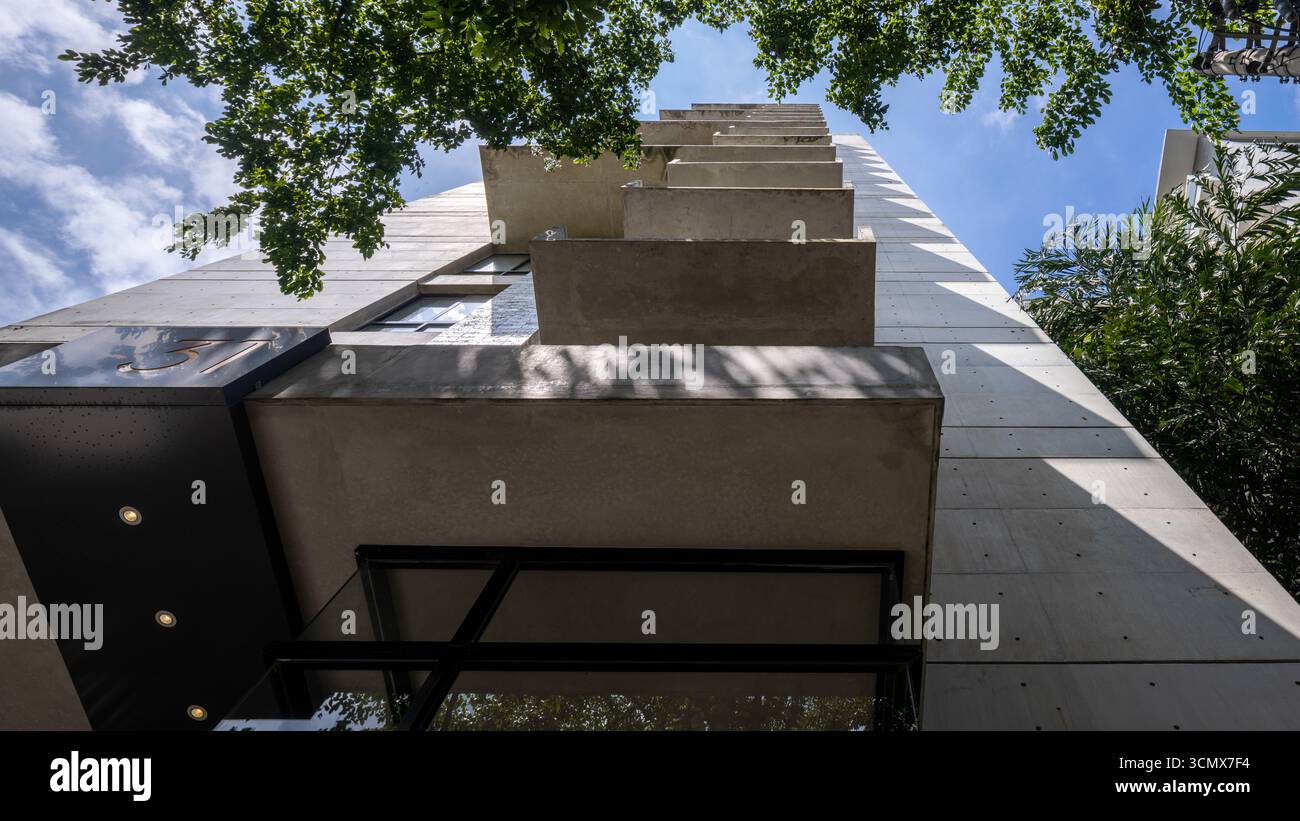 Striking apartment exterior with bold modern architecture and expansive ... - Bold Apartment Exterior Living Pace