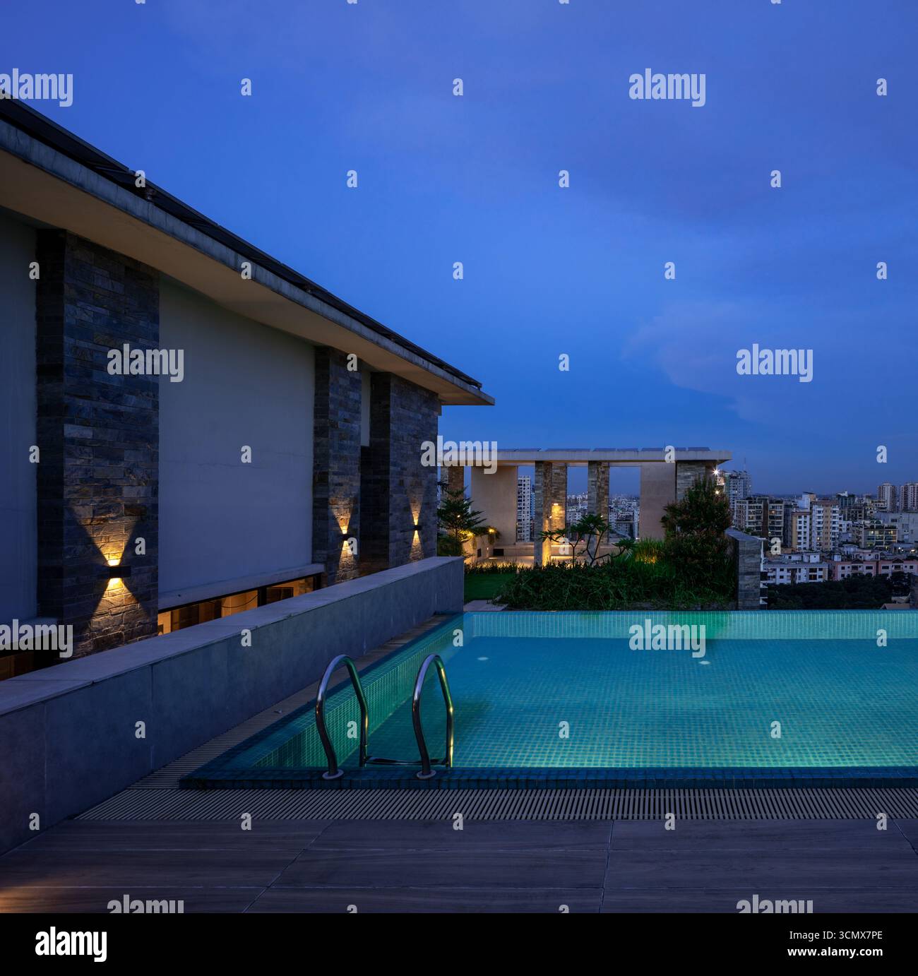 Elegant rooftop pool with panoramic city views, offering luxury ...
