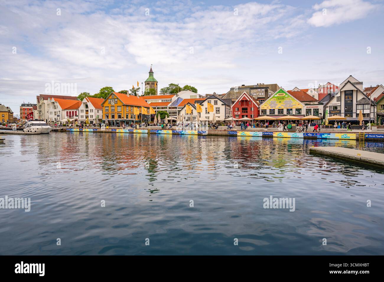 View of reflections in harbour and Stavanger skyline during daytime, Stavanger, Norway Stock Photo
