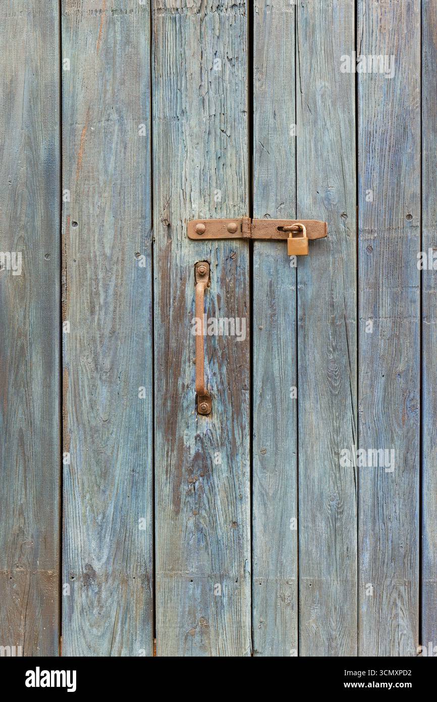 Weathered blue barn door Stock Photo