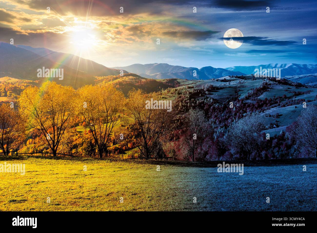 mountain landscape on autumn equinox. day and night time change concept. beautiful view with trees in colorful foliage. picturesque rural place in alp Stock Photo
