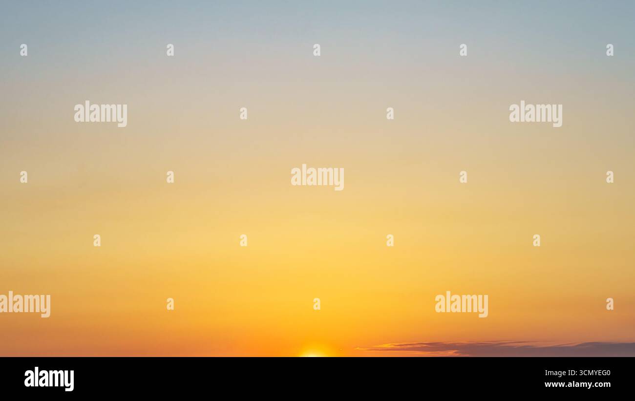 Blue sky with golden light hi-res stock photography and images - Alamy