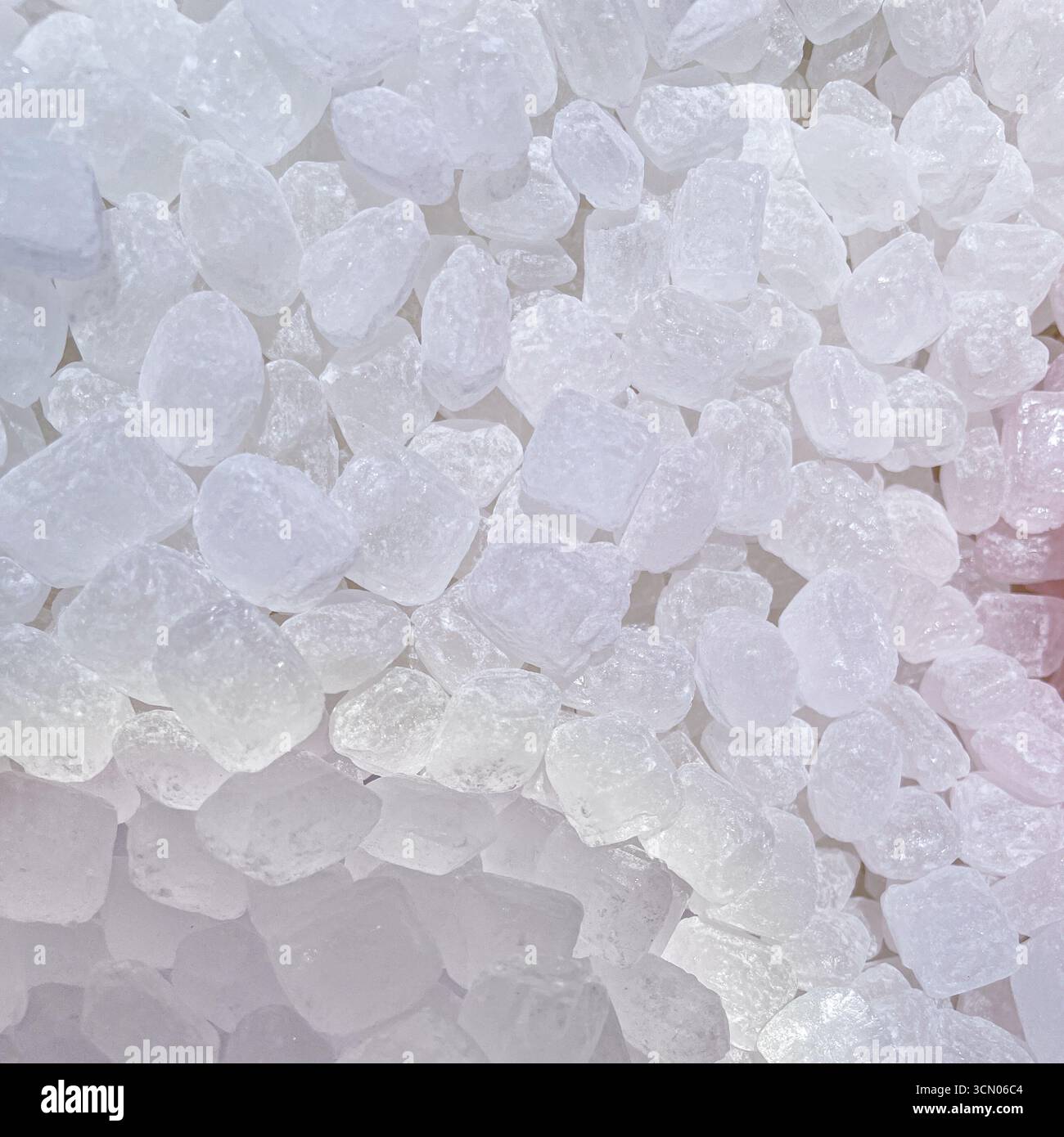 pile of white rock sugar or called gula batu, traditional Indonesian sugar as food background - Smartphone Captured Stock Image