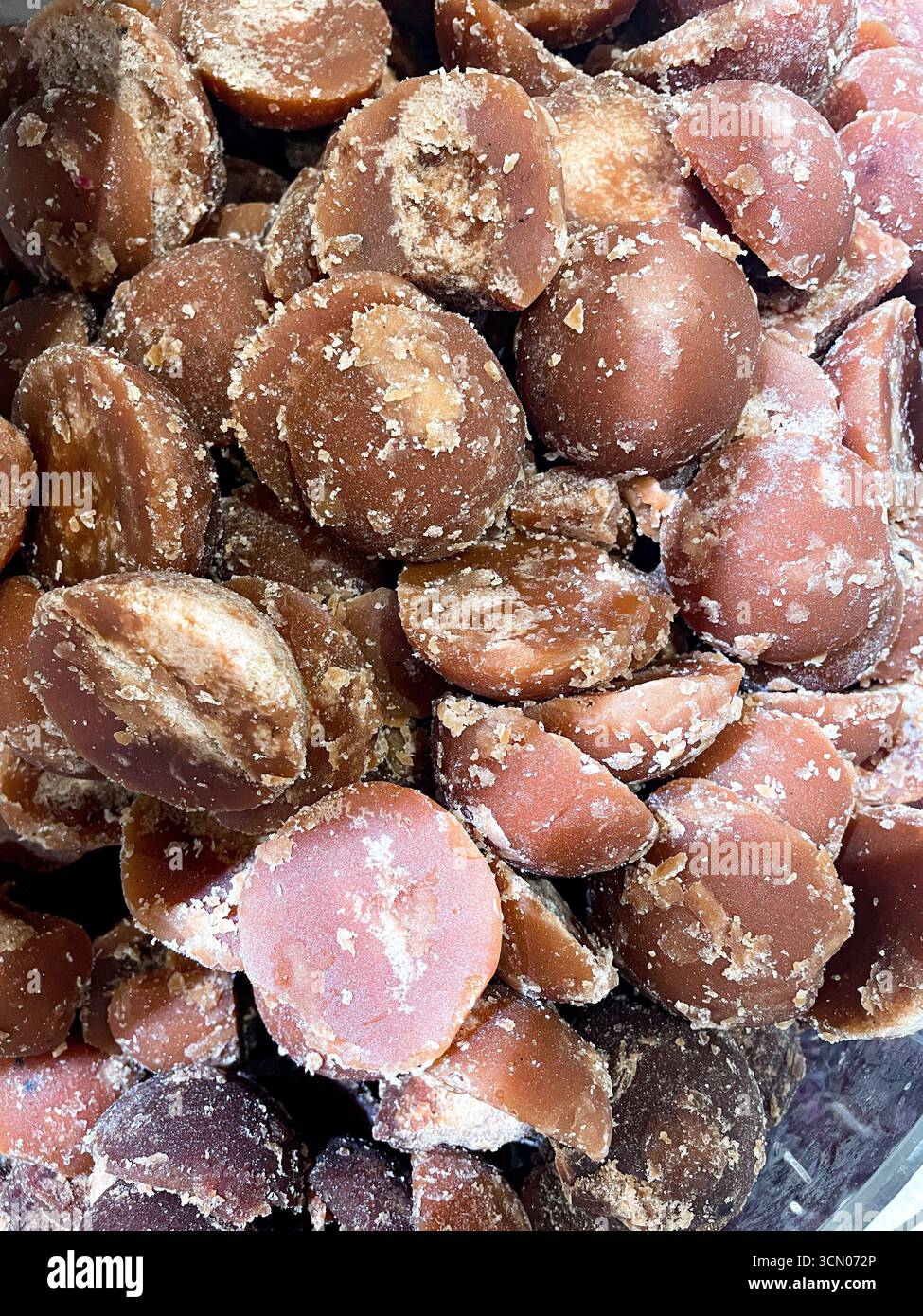 pile of palm sugar or brown sugar, Indonesia's natural sweetener, as food background - Smartphone Captured Stock Image