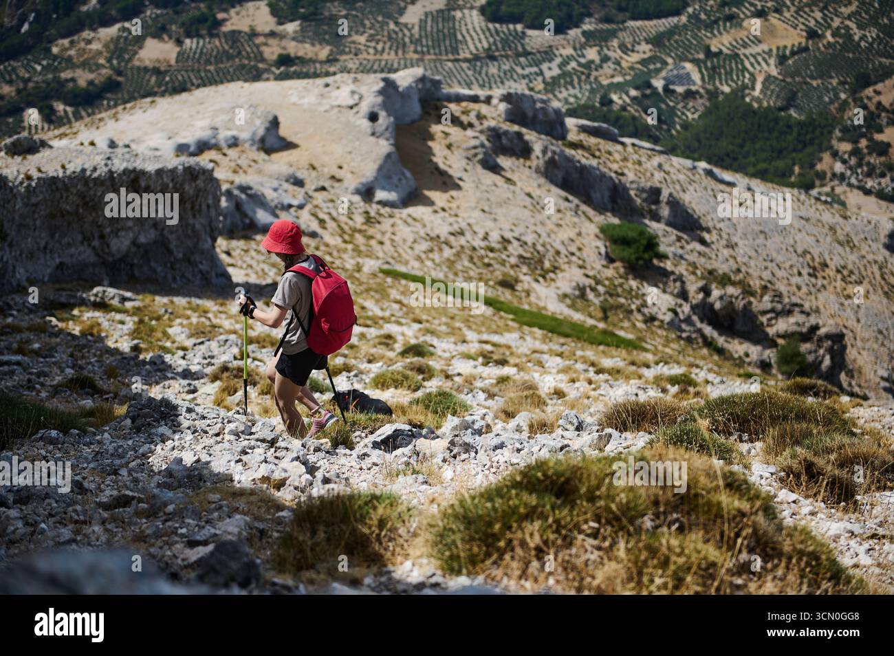 Lone hiker navigates rocky hi-res stock photography and images - Alamy