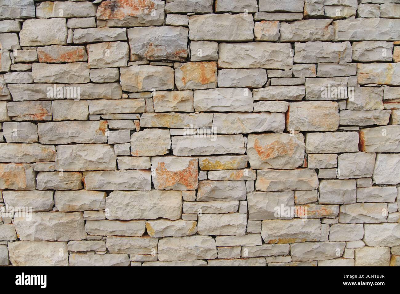 Old structured stone wall Stock Photo
