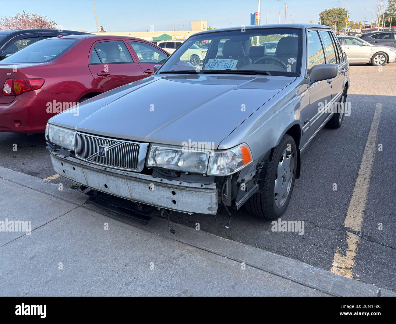 Silver Volvo Sedan With Its Front Bumper Cover Missing Revealing The 