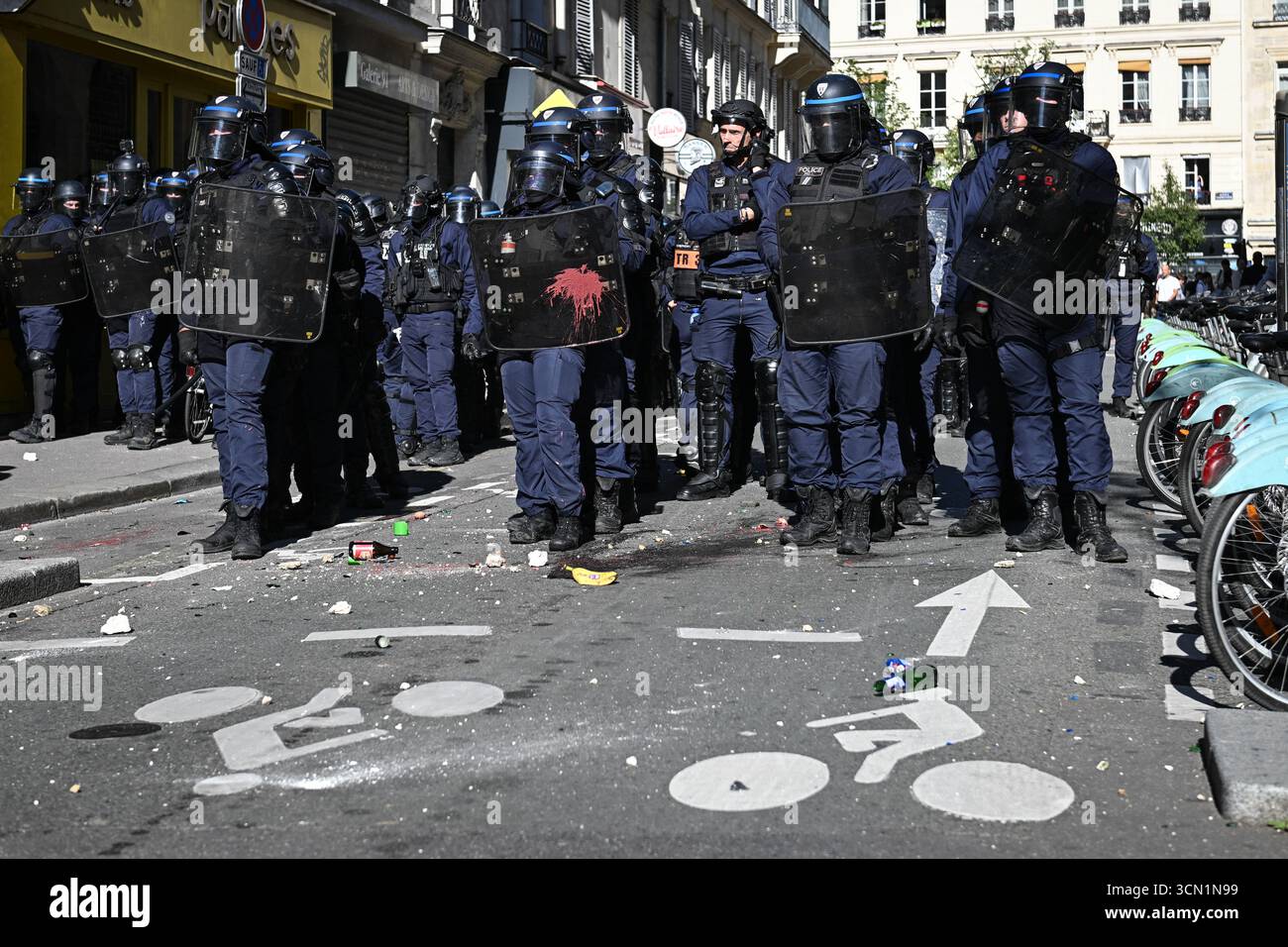 Clashes occur between French riot police and protesters during a ...