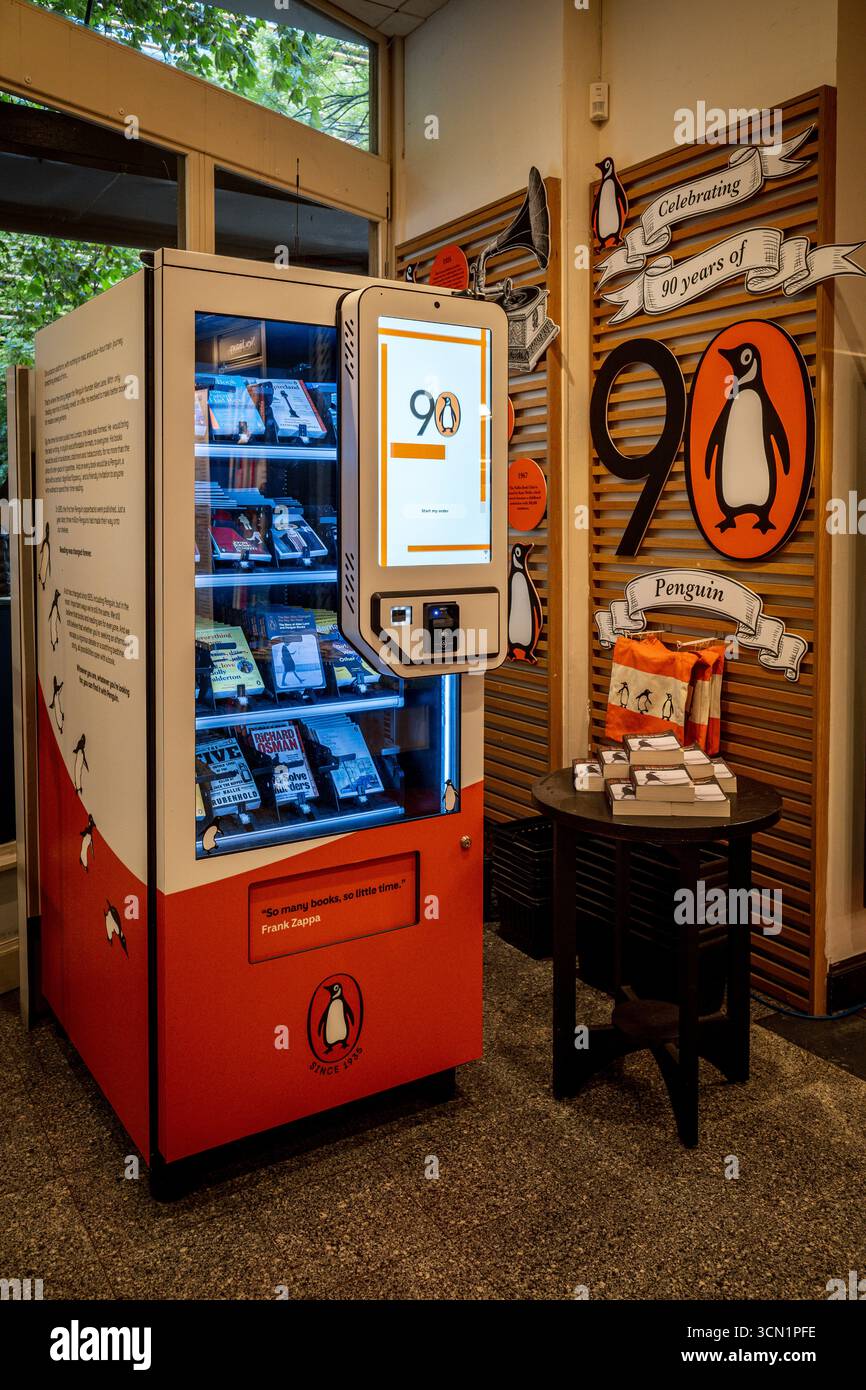 Penguin Book Dispenser London - Penguin Books vending machine highlighting the 90th Anniversary of the founding of Penguin Books, Waterstone Gower St. Stock Photo