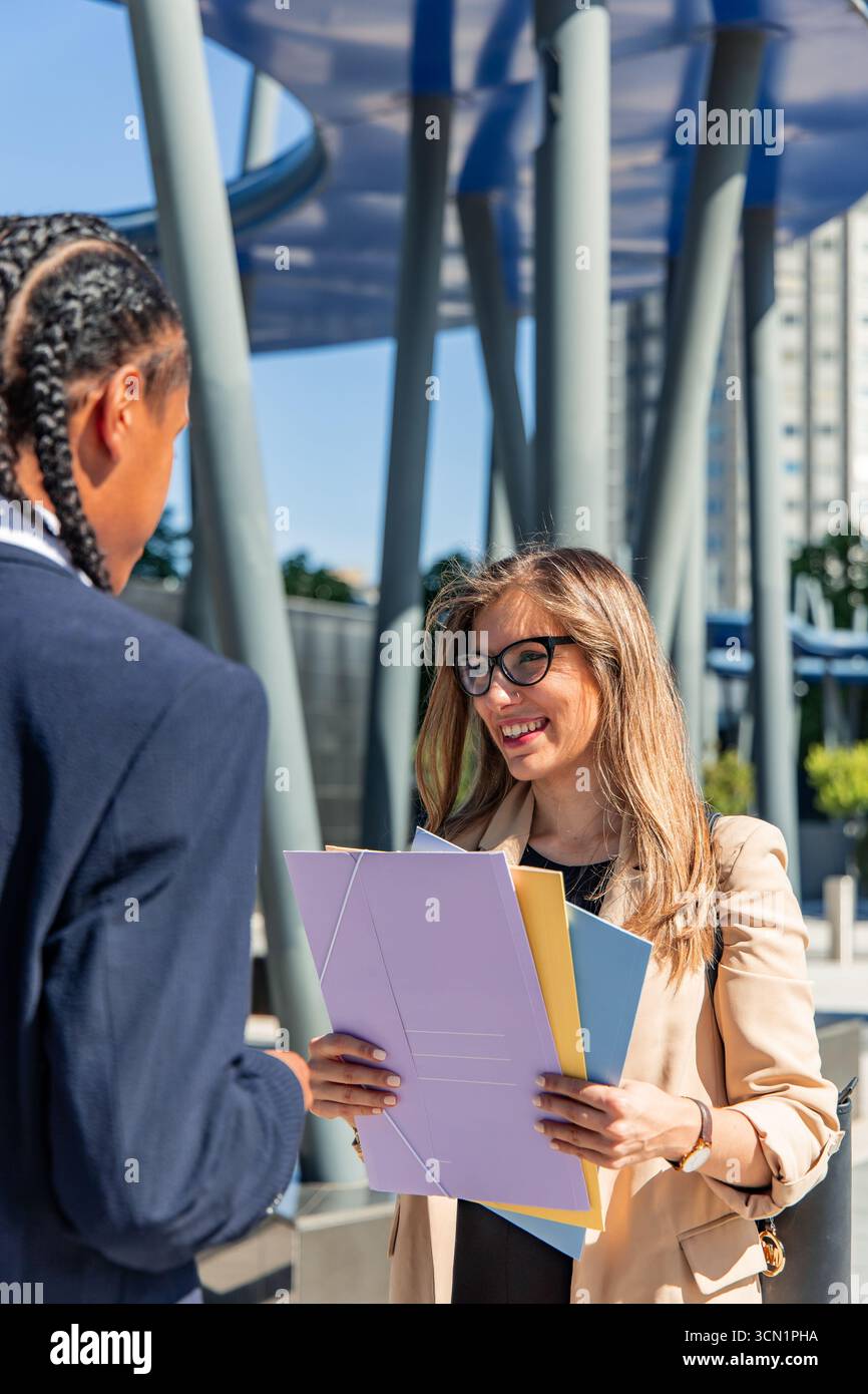 Business partners engaging in hi res stock photography and images Alamy