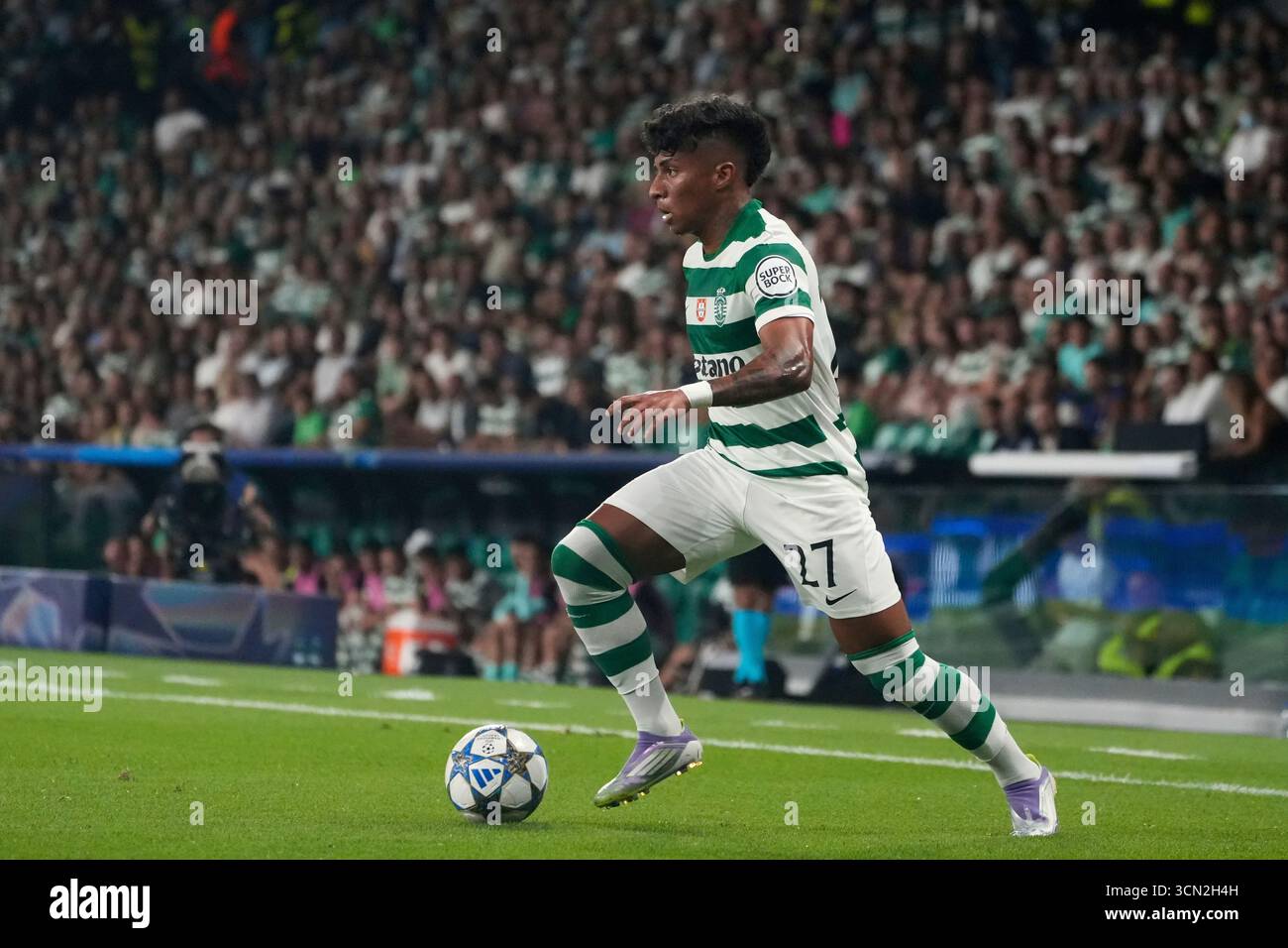 Sporting's Alisson Santos runs with the ball during the Champions ...
