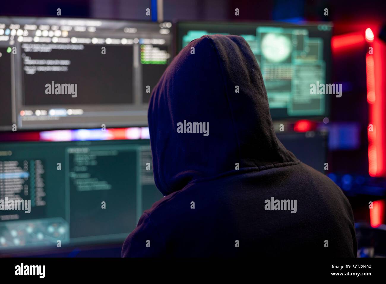 Hacker doing covert operations in hideout to bypass advanced security ...