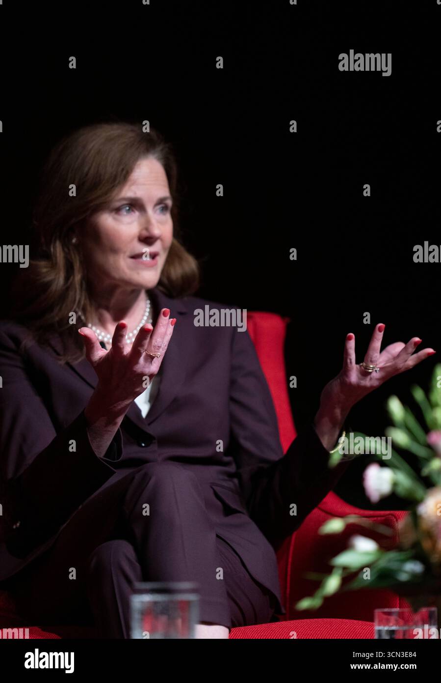 Austin, United States. 18th Sep, 2025. U.S. Supreme Court Associate Justice AMY CONEY BARRETT talks about her new book, 'Listening To The Law', during a one-hour talk with historian Mark Updegrove (not shown) at the LBJ Library in Austin, TX on September 18, 2025. Barrett discussed her life on the Supreme Court and insights into how decisions are made. Credit: Bob Daemmrich/Alamy Live News Stock Photo