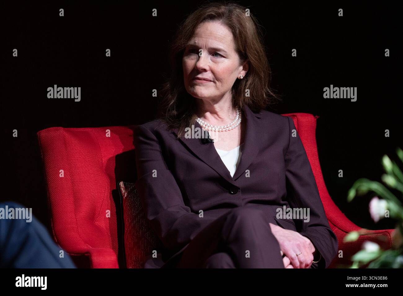 Austin, United States. 18th Sep, 2025. U.S. Supreme Court Associate Justice AMY CONEY BARRETT talks about her new book, 'Listening To The Law', during a one-hour talk with historian Mark Updegrove (not shown) at the LBJ Library in Austin, TX on September 18, 2025. Barrett discussed her life on the Supreme Court and insights into how decisions are made. Credit: Bob Daemmrich/Alamy Live News Stock Photo