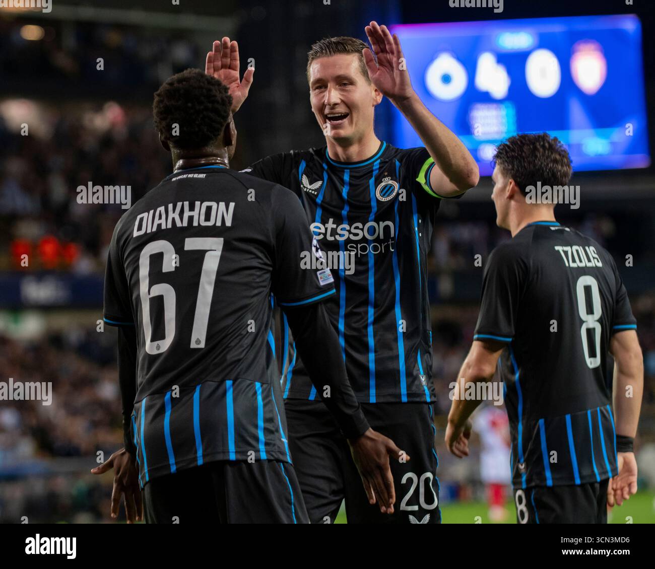 Rene Vandereycken and Fons Bastijns of Club Brugge celebrate in the