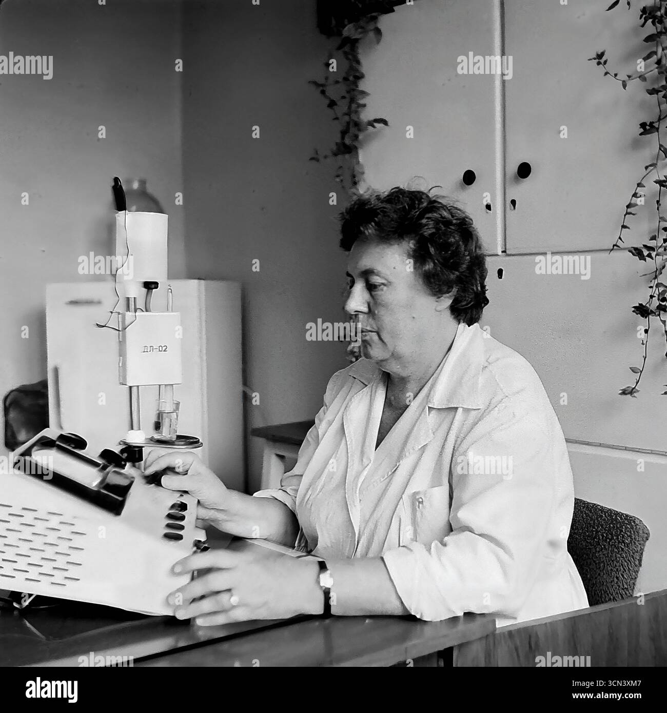 Soviet Testing Lab A historical photograph from the 1970-80s, capturing a female lab ...