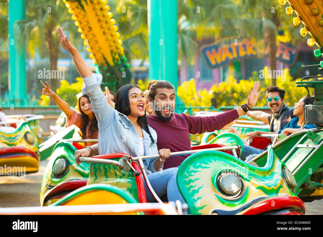 Group of Friends Having Fun on Roller Coaster - Exciting Amusement Park ...